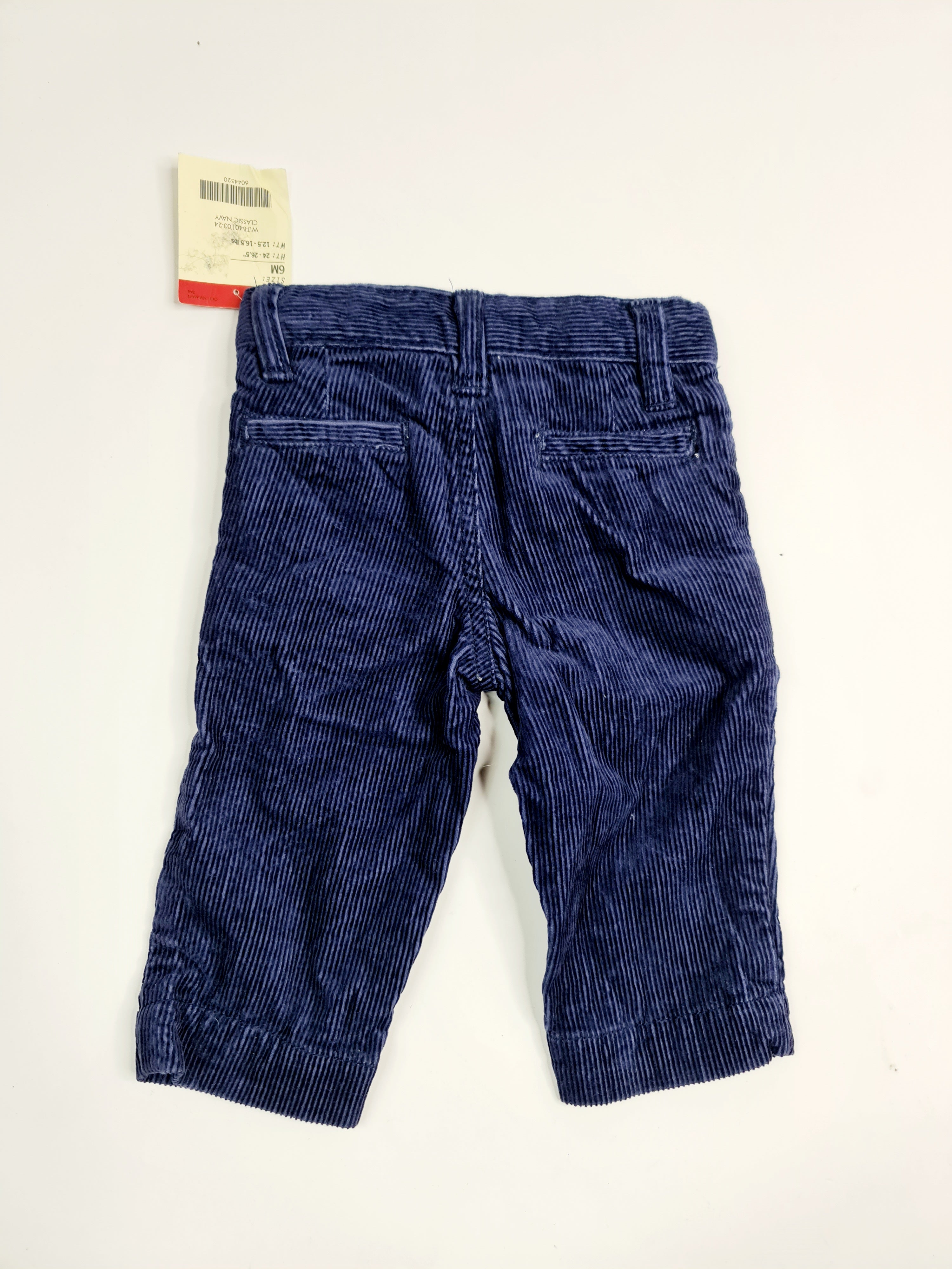 Pantalones de mezclilla azul oscuro marca OshKosh, para bebé de 6 meses.